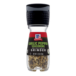 ['A McCormick Garlic Pepper Seasoning Adjustable Grinder with a clear glass container filled with the seasoning.']