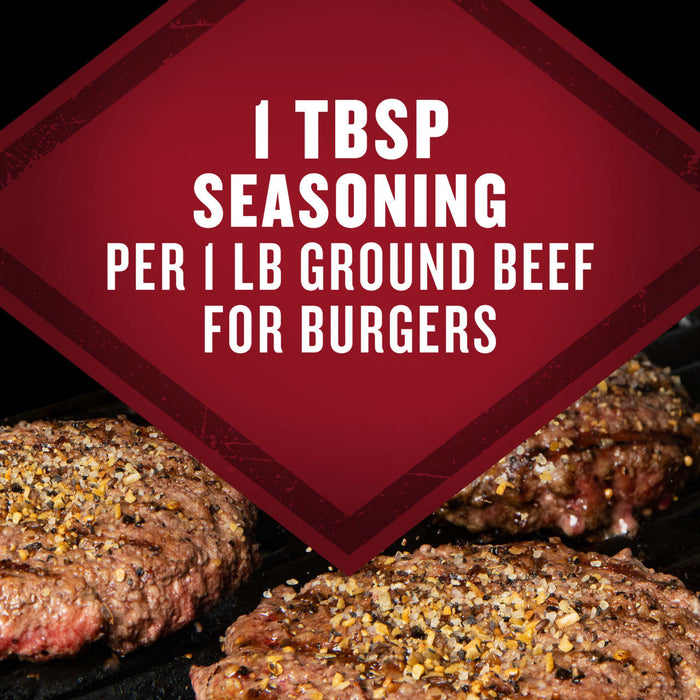 The image shows a close-up of seasoned burgers on a grill with text overlay stating 1 TBSP seasoning per 1 LB ground beef for burgers.