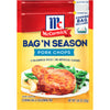 ["McCormick Bag'N Season Pork Chops package with a picture of a cooked pork chop with green beans and potatoes."]
