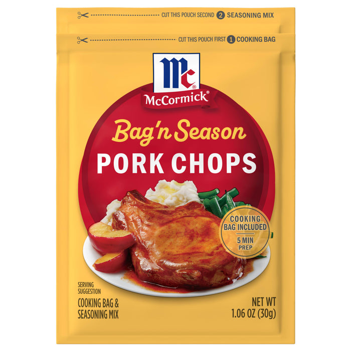 A yellow packet of Mccormick Bag N Season Regular Pork Chop Seasoning Mix &amp; Cooking Bag 1.06 Oz featuring a serving suggestion of a glazed pork chop with mashed potatoes and green beans.
