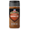 A clear plastic bottle of Mccormick Grill Mates Barbecue Seasoning, featuring a black label with the brand logo and product name, filled with reddish-brown spice.
