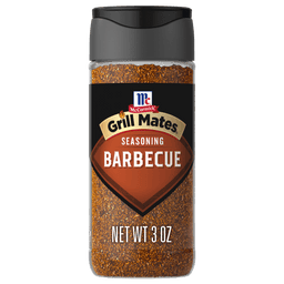 A clear plastic bottle of Mccormick Grill Mates Barbecue Seasoning, featuring a black label with the brand logo and product name, filled with reddish-brown spice.