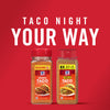 Two McCormick Taco Seasoning jars one original and one mild on a red background with the text Taco Night Your Way.