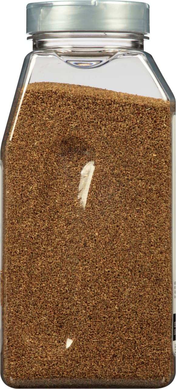 A clear plastic jar filled with whole celery seeds.