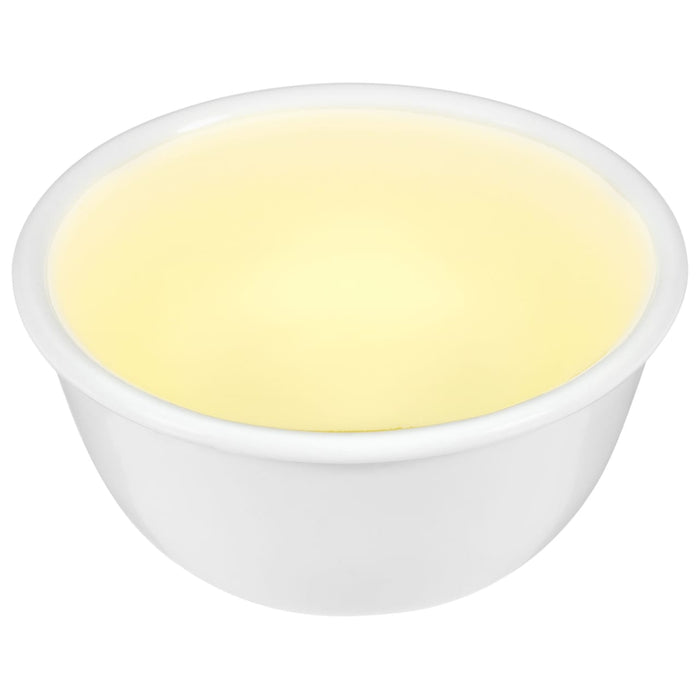 A white bowl filled with a light yellow liquid.