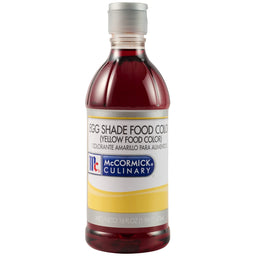 A bottle of Mccormick Culinary Egg Yellow Food Coloring 16 Oz is shown against a white background, with its label identifying the dark red liquid as yellow food coloring.