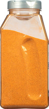 A clear plastic jar filled with orange powder.