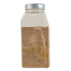 A clear plastic bottle with a silver lid filled with brown spices.