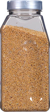 A clear plastic jar filled with yellow mustard seeds.