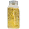 A clear plastic jar filled with yellow seasoning.