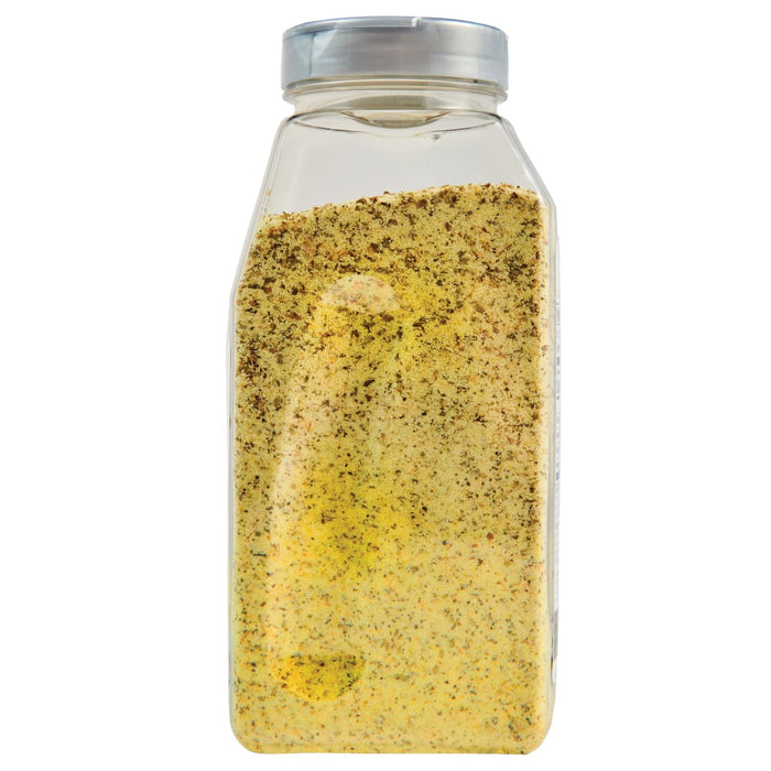 A clear plastic bottle filled with yellow seasoning.