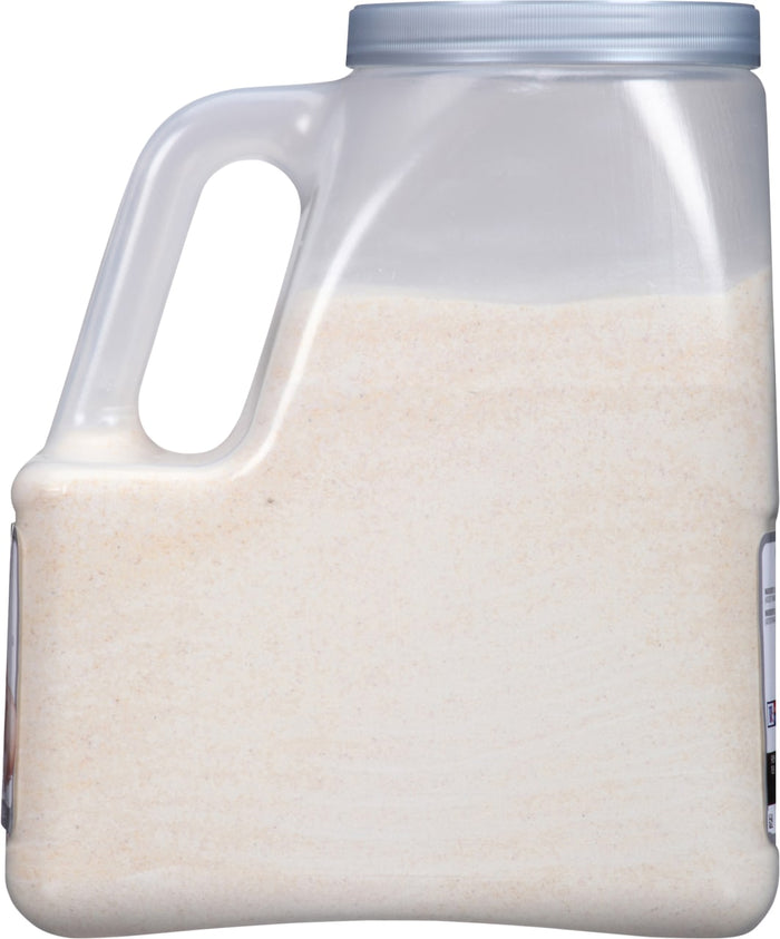 A plastic container filled with white powder.