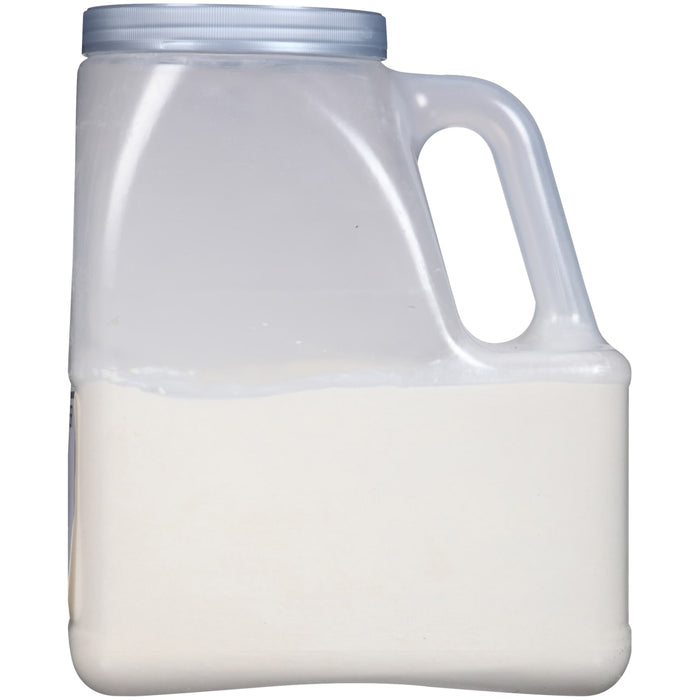 A white plastic jug with a white lid filled with a white substance.