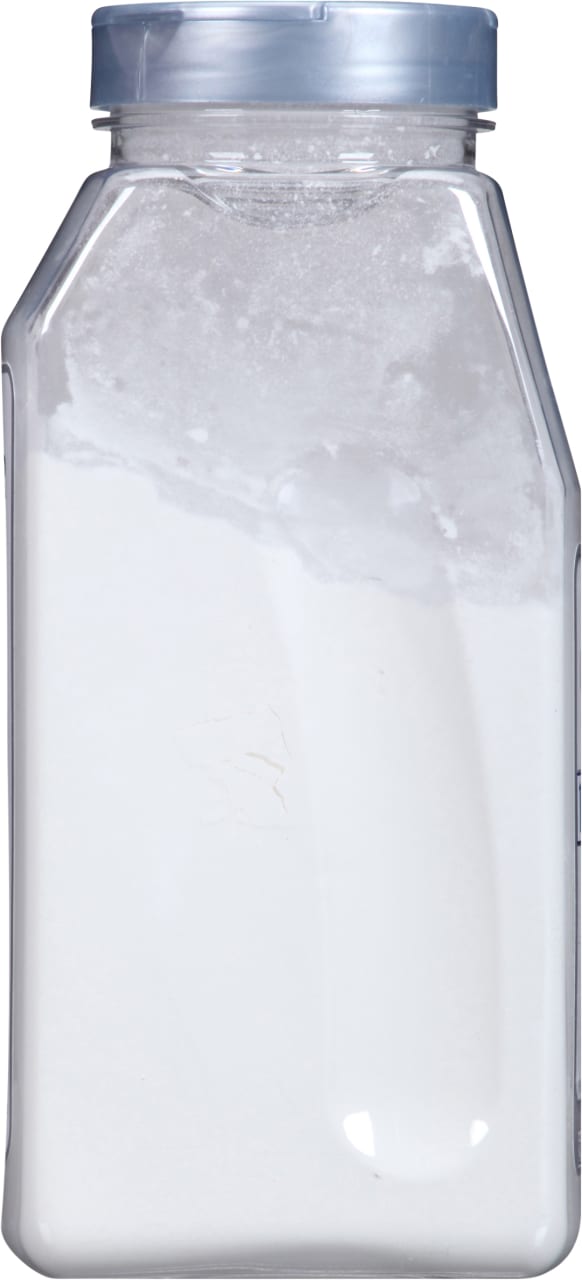 A clear plastic jar with a white lid filled with white powder.