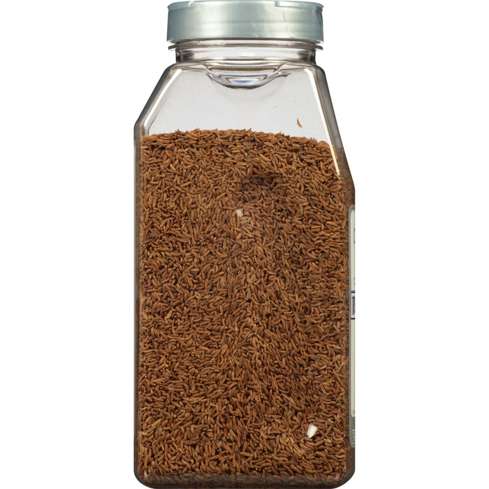 A glass jar filled with caraway seeds.