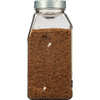 A glass jar filled with caraway seeds.