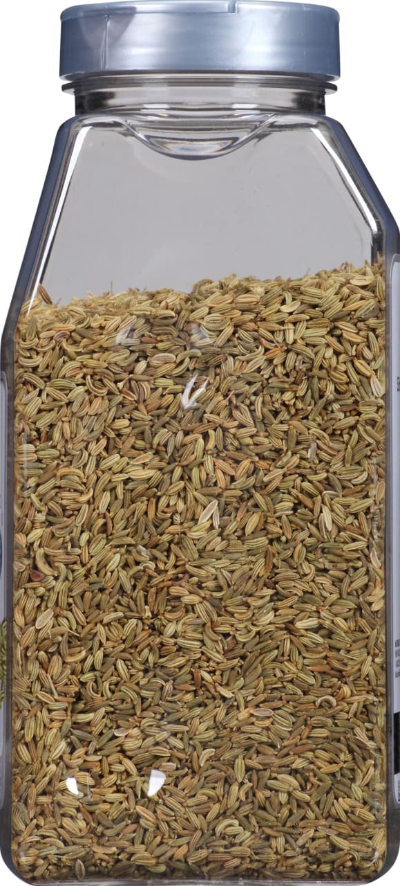 A clear plastic jar filled with fennel seeds.