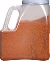 A clear plastic container filled with red chili powder.