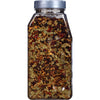 A glass jar filled with a blend of spices.