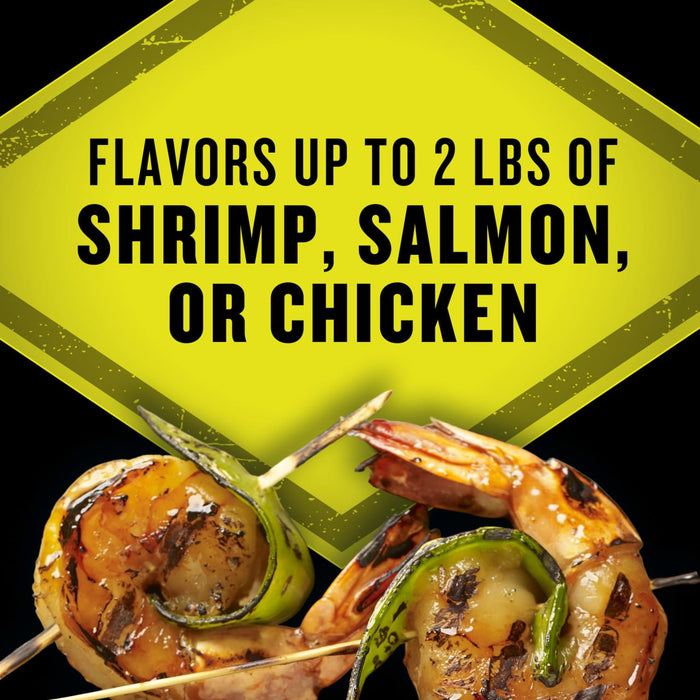 This product flavors up to 2 lbs of shrimp, salmon, or chicken, as shown in the image with grilled shrimp skewers.