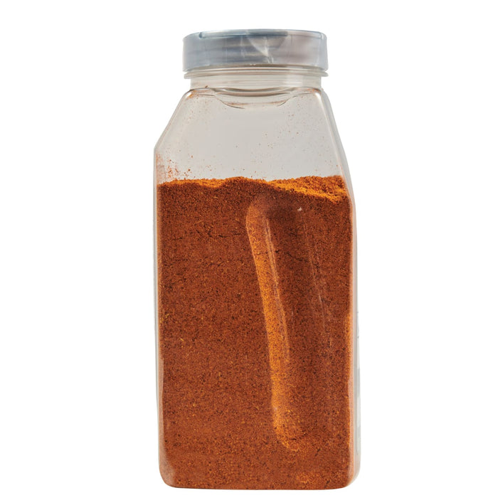 A clear plastic jar filled with a brown spice.