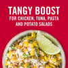 A bowl of corn salad with a lime wedge on top with the text Tangy Boost for Chicken Tuna Pasta and Potato Salads above it.