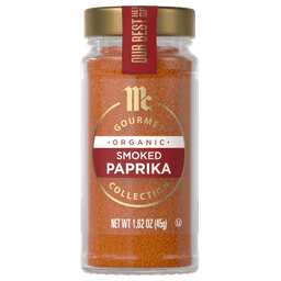 A jar of McCormick Gourmet Organic Smoked Paprika Collection is displayed, showcasing its vibrant color and branding.