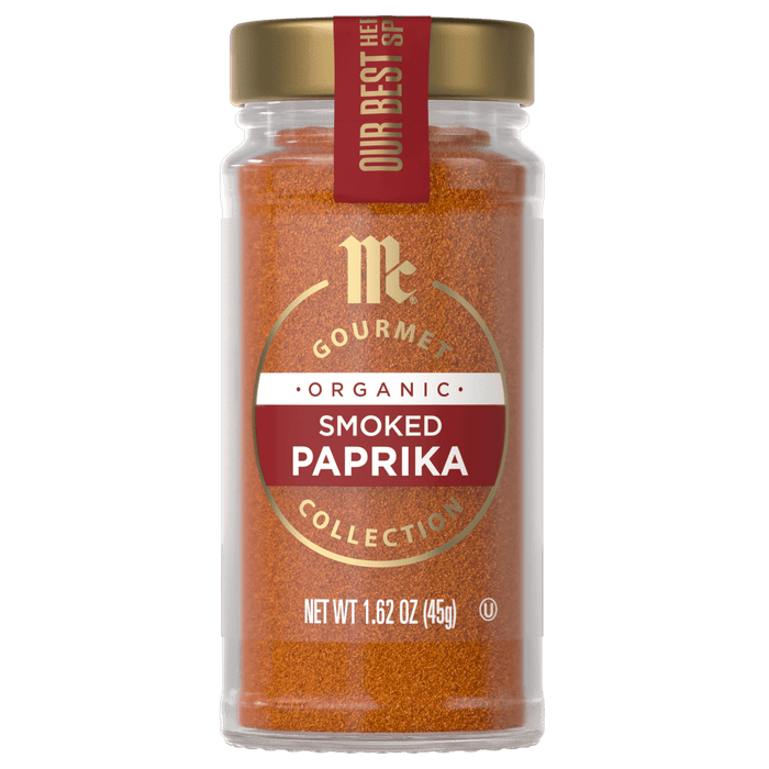 A jar of McCormick Gourmet Organic Smoked Paprika Collection is displayed, showcasing its vibrant color and branding.