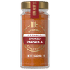 A jar of McCormick Gourmet Organic Smoked Paprika Collection is displayed, showcasing its vibrant color and branding.