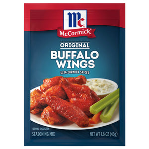 McCormick Original Buffalo Wings Seasoning Mix package with a serving suggestion of buffalo wings celery carrots and blue cheese dip.