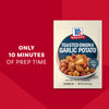 A package of Mccormick Toasted Onion And Garlic Seasoning Mix 1.25 Oz is displayed next to a bowl of roasted potatoes, with text highlighting the 10-minute prep time.