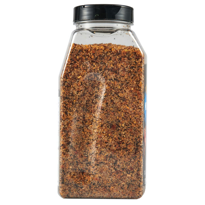 A clear plastic bottle filled with a blend of spices.