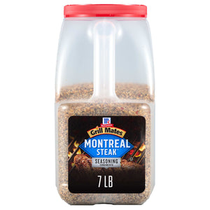 A container of McCormick Montreal Steak Seasoning.
