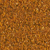 A close-up of a blend of spices including garlic herbs and salt.