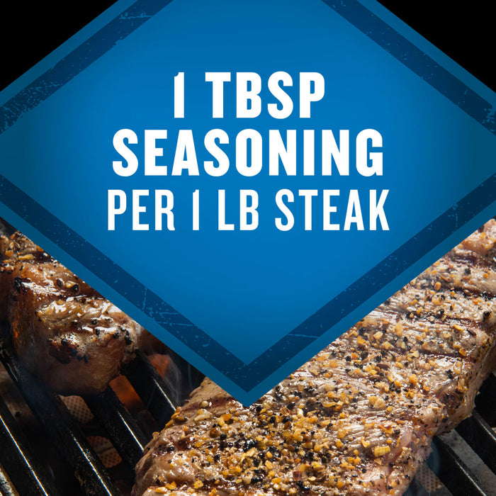 A close-up of steaks on a grill with the text 1 TBSP seasoning per 1 lb steak superimposed on a blue diamond.