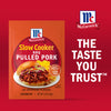 McCormick Slow Cooker Pulled Pork seasoning mix package features a sandwich with pulled pork and coleslaw.