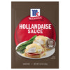 A brown packet of Mccormick Regular Hollandaise Sauce Mix Envelope 1.25 Oz featuring a serving suggestion of eggs benedict with asparagus on a red circular background.