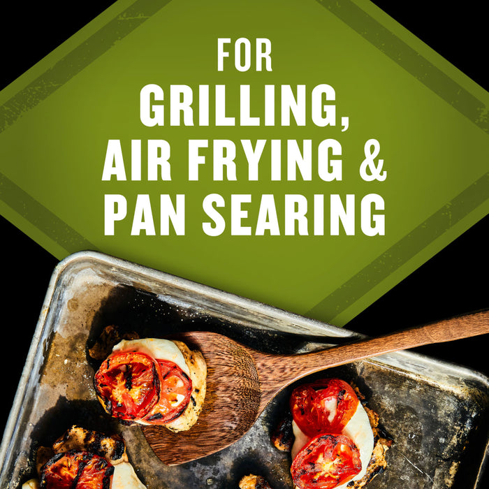 A close-up shot of grilled chicken topped with tomatoes and mozzarella on a baking sheet with text overlay stating For Grilling Air Frying &amp; Pan Searing.