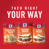 Three McCormick taco seasoning packets with different flavors: Mexican Style Street Corn Taco Chicken Taco and Cheesy Taco.