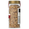 A glass jar of McCormick Organic Basil.