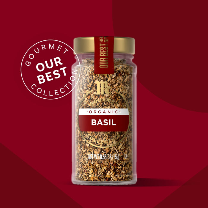 A jar of McCormick Gourmet Basil seasoning, part of their Our Best Collection.