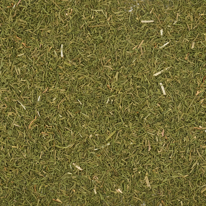 A close-up of dried, cut herbs, likely for culinary use.
