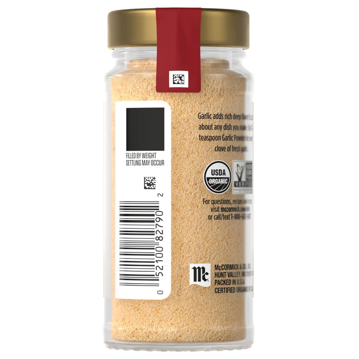 A jar of McCormick Organic Garlic Powder with a gold lid and a red label.