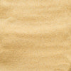 Close-up of rippled sand, evoking a sense of calm and natural texture.