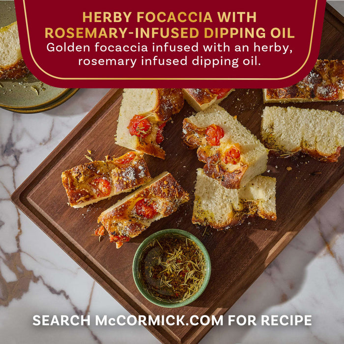 A close-up shot of McCormick's herby focaccia with rosemary-infused dipping oil, showcasing the golden focaccia infused with herbs.