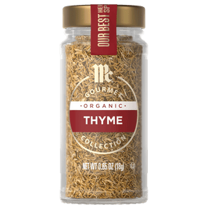 A jar of McCormick Gourmet Organic Thyme seasoning.