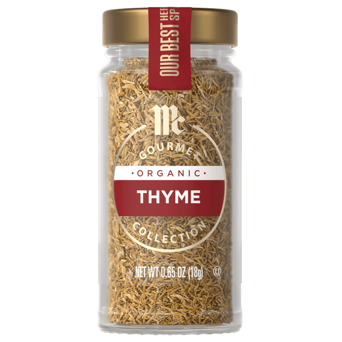 A jar of McCormick Gourmet Organic Thyme seasoning.