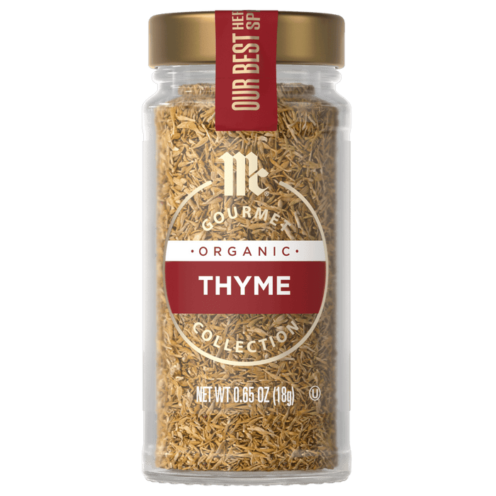 A jar of McCormick Gourmet Organic Thyme seasoning.