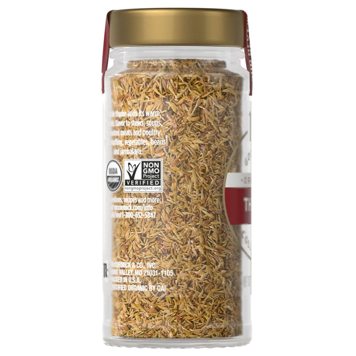 A jar of McCormick organic thyme is shown, highlighting its non-GMO verification and versatility in various dishes.