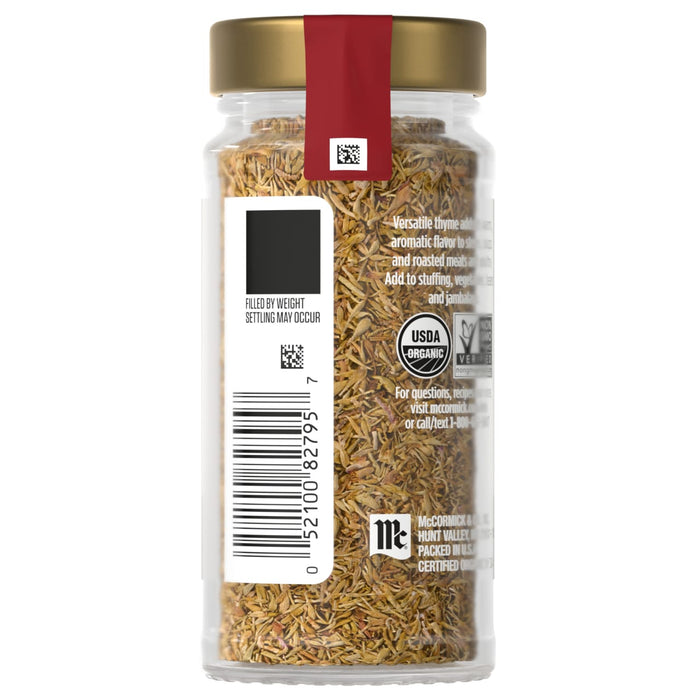 A jar of McCormick Organic Thyme is shown, filled with dried thyme and labeled with information about its use and organic certification.